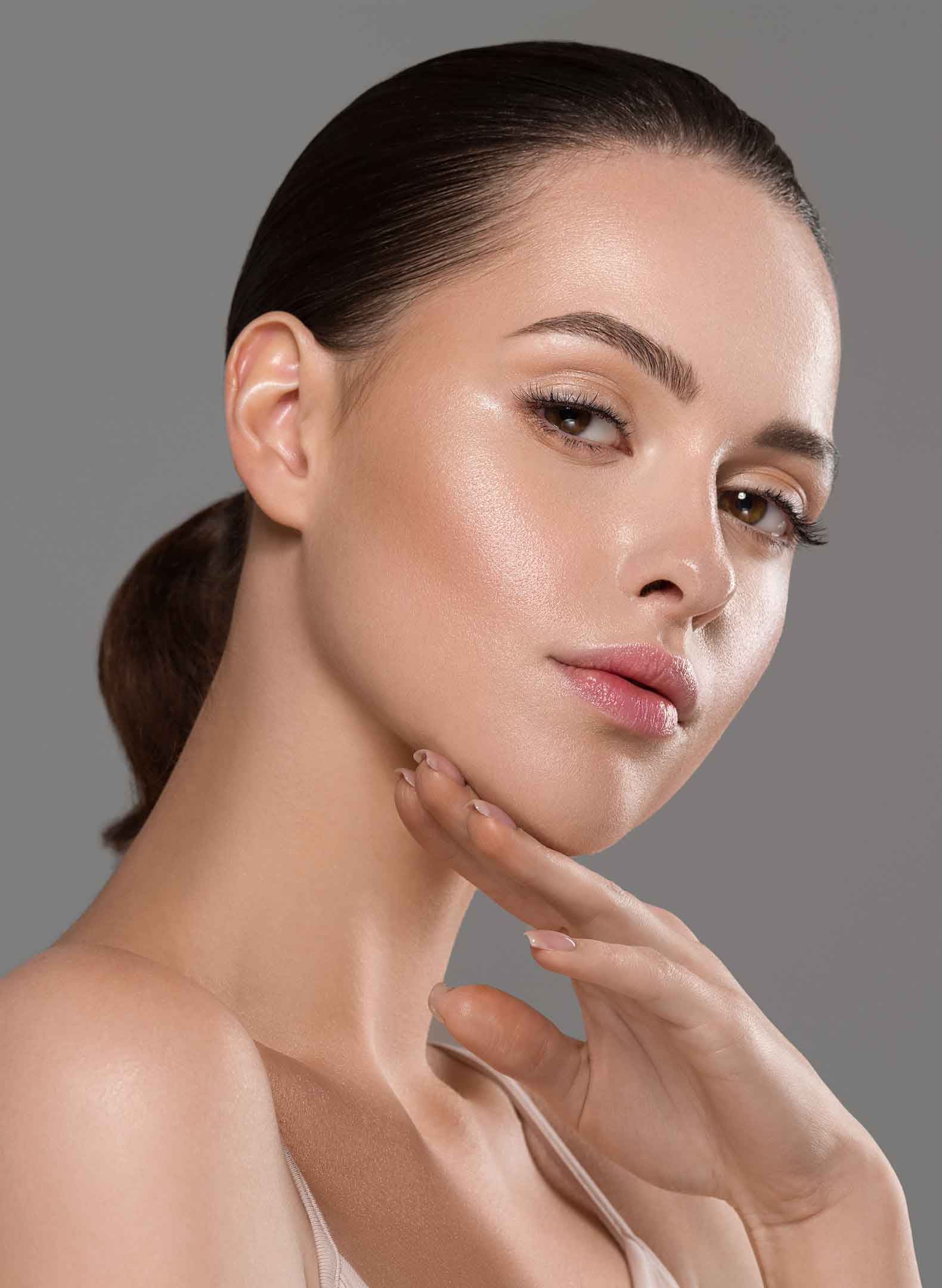 woman profile touching her chin