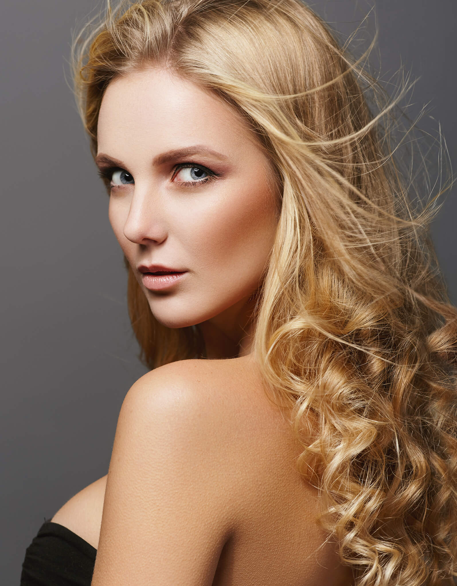 young woman with blonde hair and beautiful blue eyes